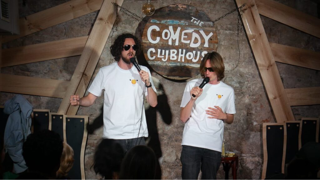 Darren Cullen and Ewan May perform at the Comedy Clubhouse in Fat Goose t-shirts